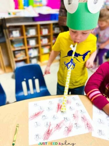 child playing preschool alphabet game
